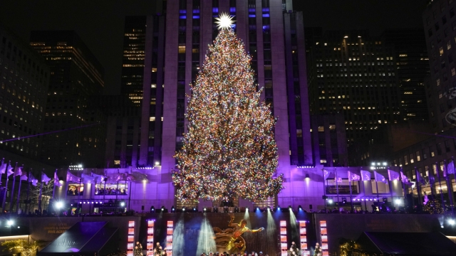 The Christmas tree at Rockefeller Center is lit in New York.